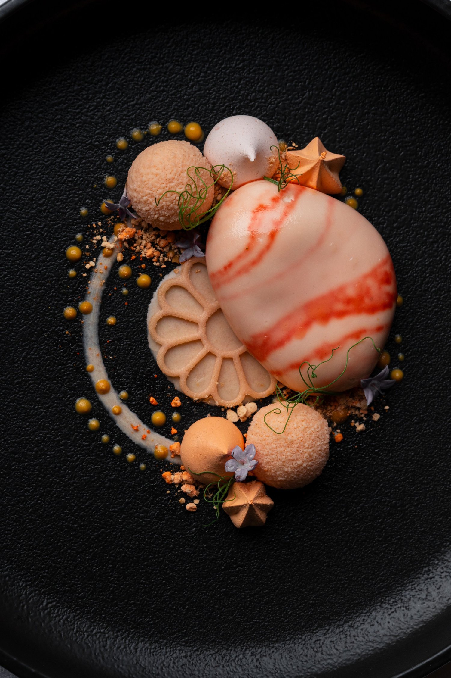 Dessert on black ceramic