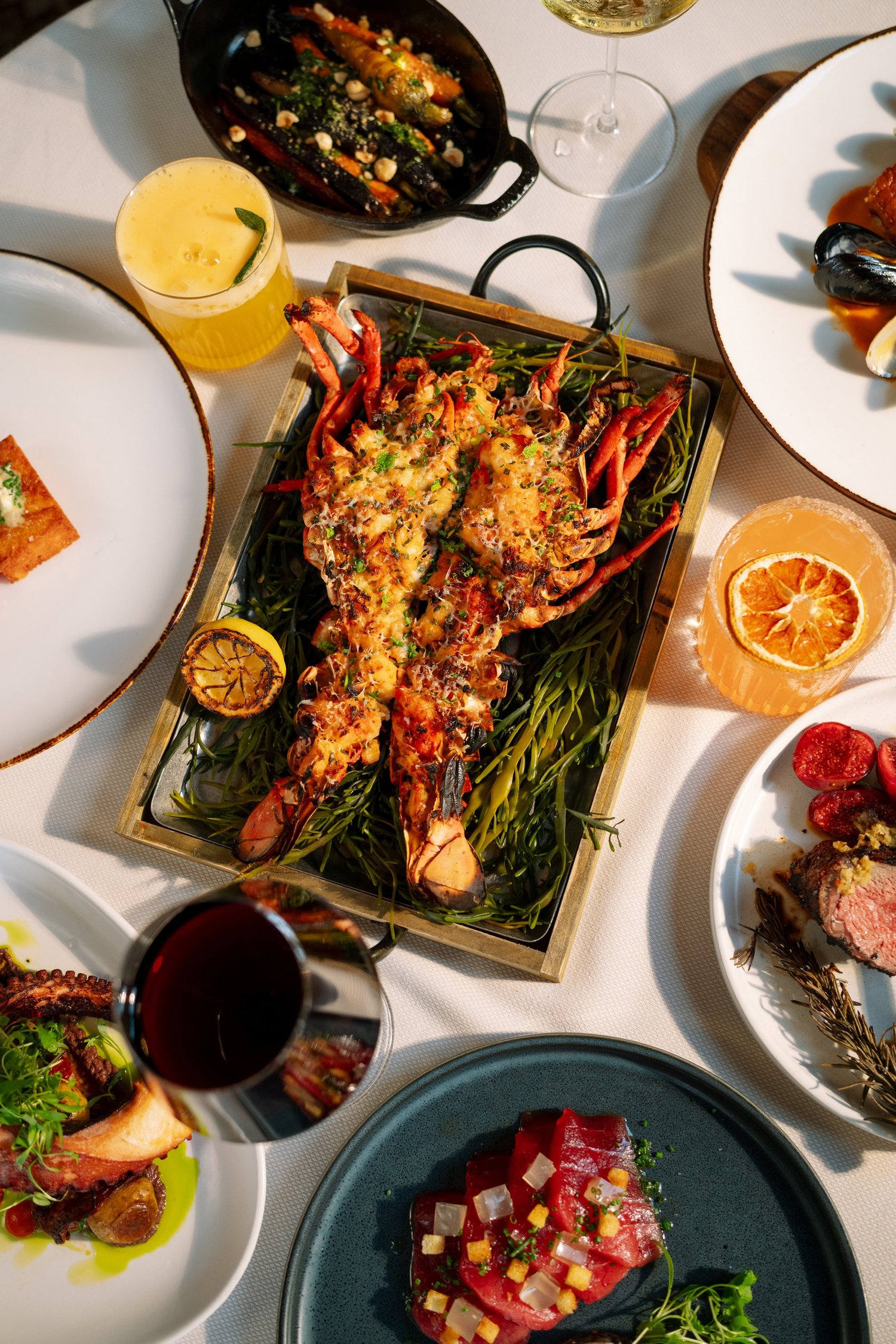 Fire-grilled lobster table spread